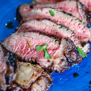 Closeup of medium rare pink coulotte steak recipe.