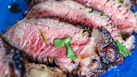 Closeup of medium rare pink coulotte steak recipe.
