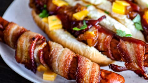 Closeup shot of Bacon Wrapped Hot Dogs.