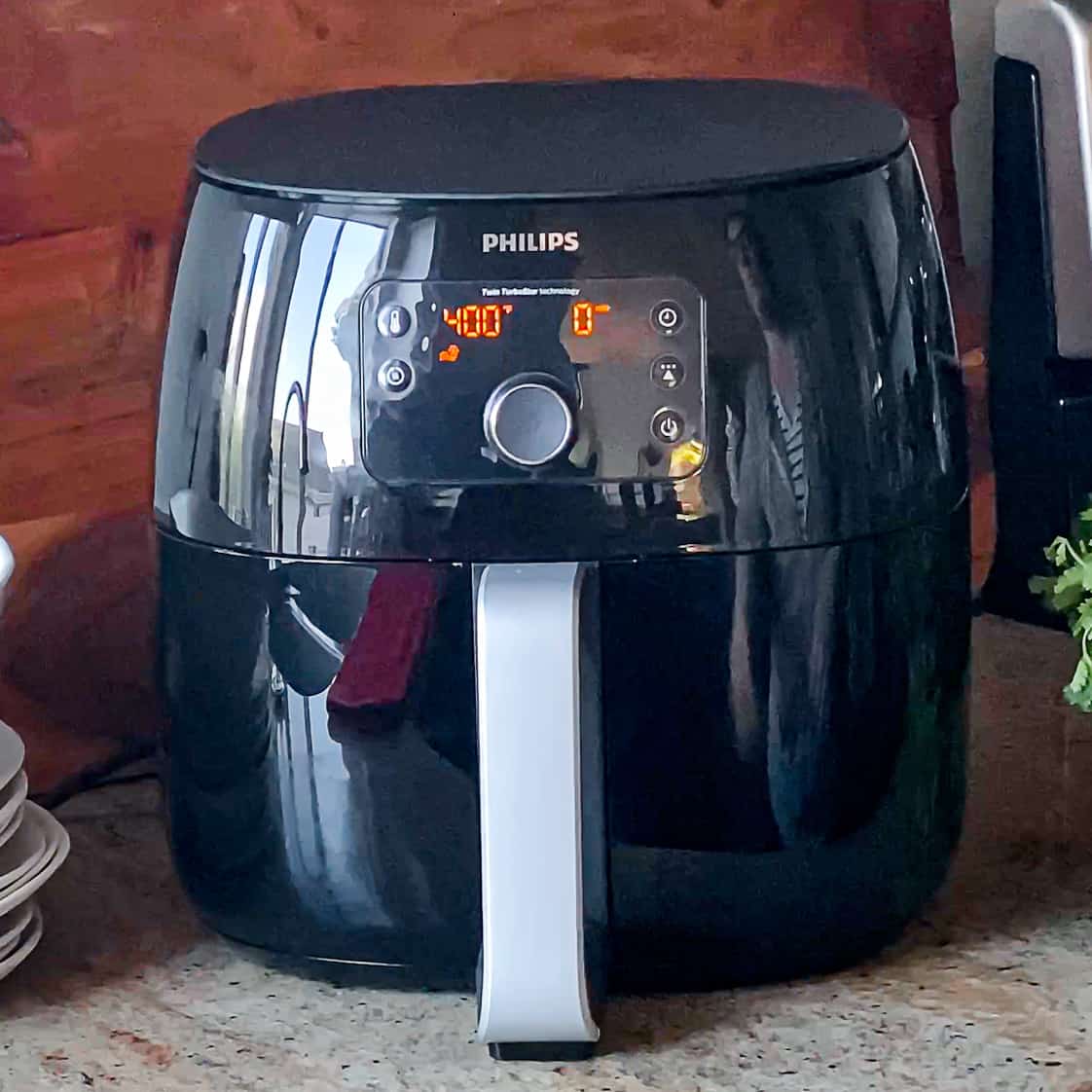 Air fry machine cooking Frozen food in air fryer.