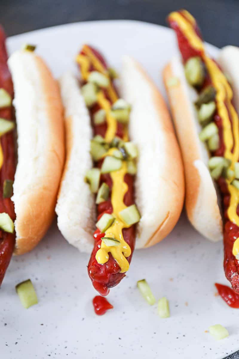 Gourmet Air Fryer Hot Dogs with condiments.