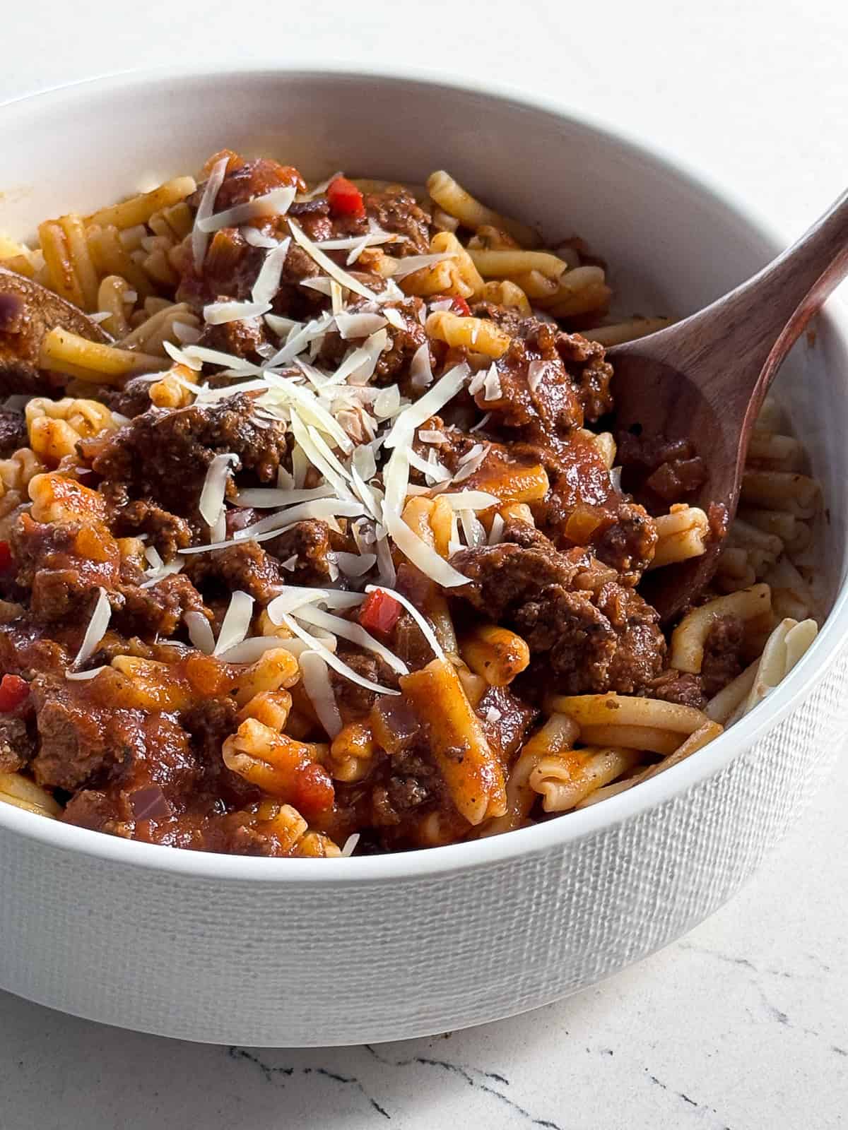 Homemade Pasta Sauce with Ground Beef Bowl of pasta topped with hearty homemade ground beef tomato sauce