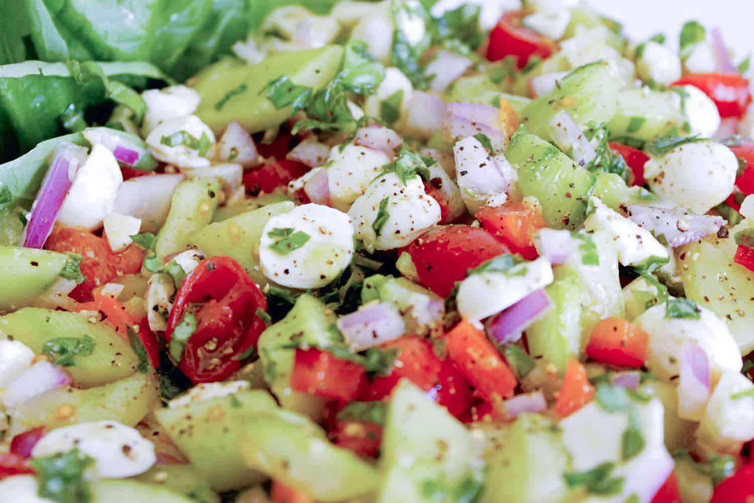 Caprese side salad using summer produce.