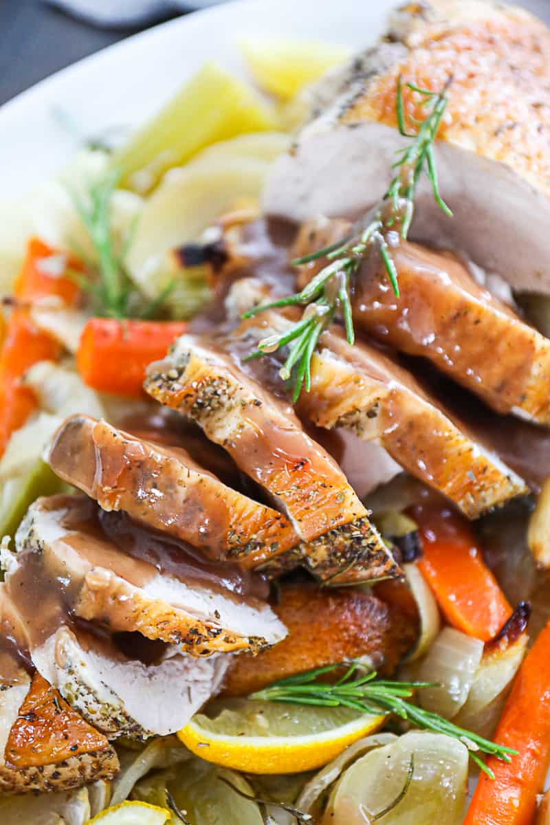 Roasted Turkey Breast With herbs vegetables and gravy