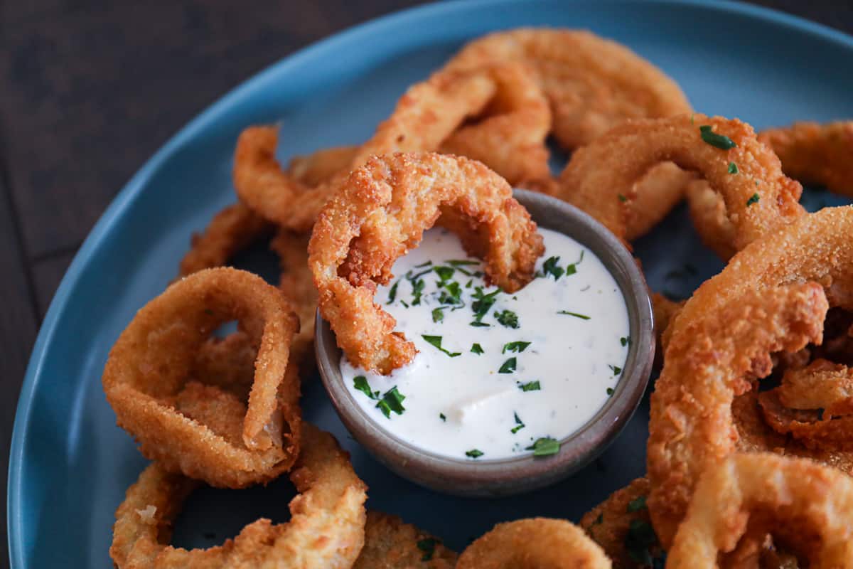 Crispy Frozen Onion Rings in the air fryer with blue cheese dipping sauce