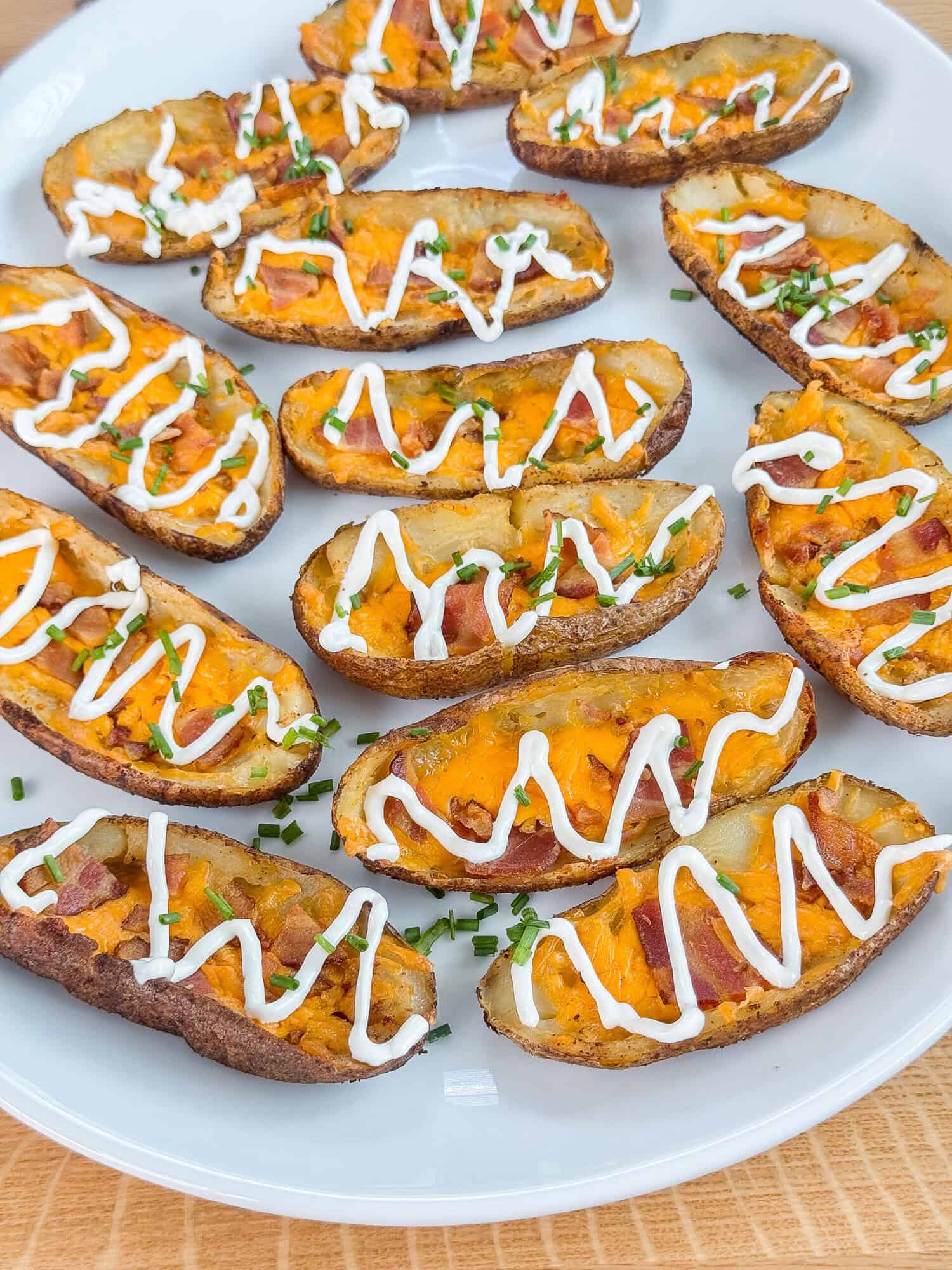 Traeger smoked potato skins with bacon served on an appetizer platter