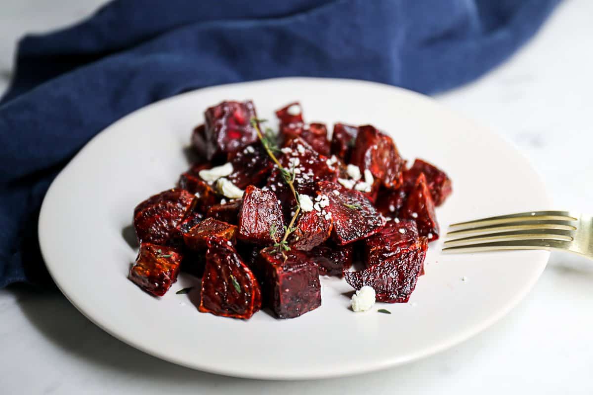 Air Fryer Beets Roasted and plated with fresh herbs and feta cheese
