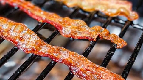 https://sipbitego.com/wp-content/uploads/2022/04/Cooking-Traeger-Smoked-Bacon-on-Pellet-Grill-Grates-Sip-Bite-Go-480x270.jpg