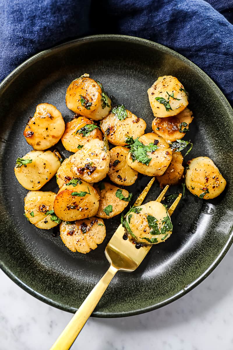 Traeger smoked scallops appetizer with the lemon butter sauce