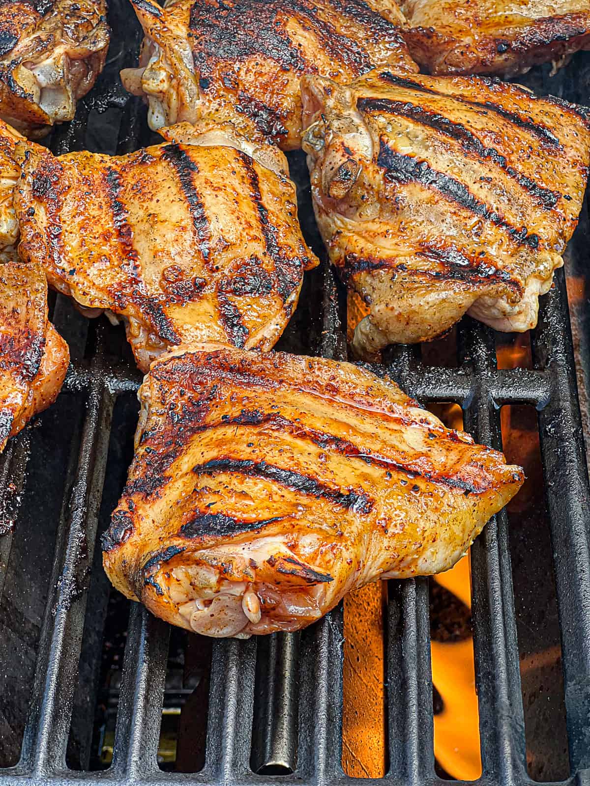 BBQ Grilled Chicken Thighs with skin on and grill marks