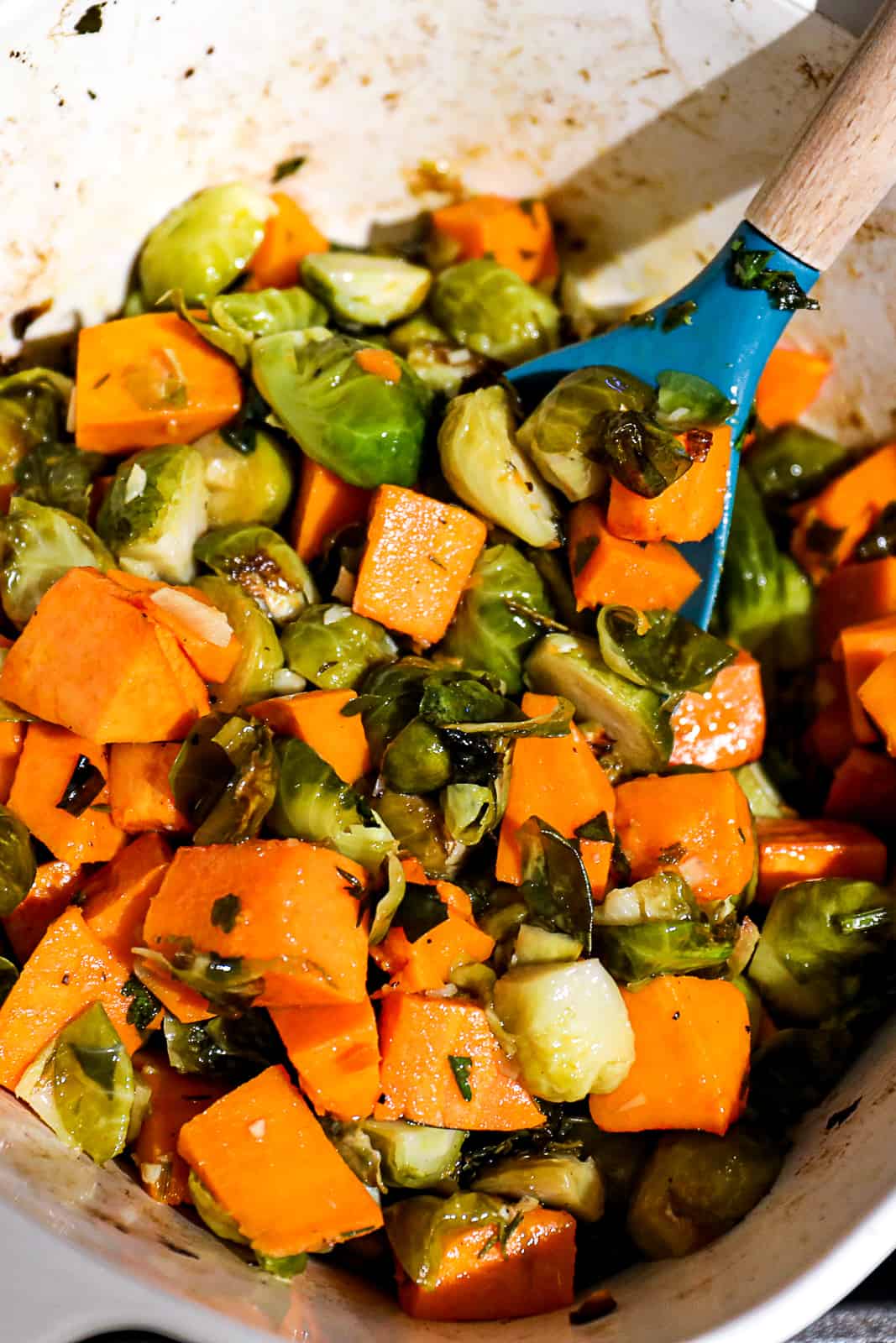 Oven Roasted Brussel Sprouts And Sweet Potatoes in a Baking Dish