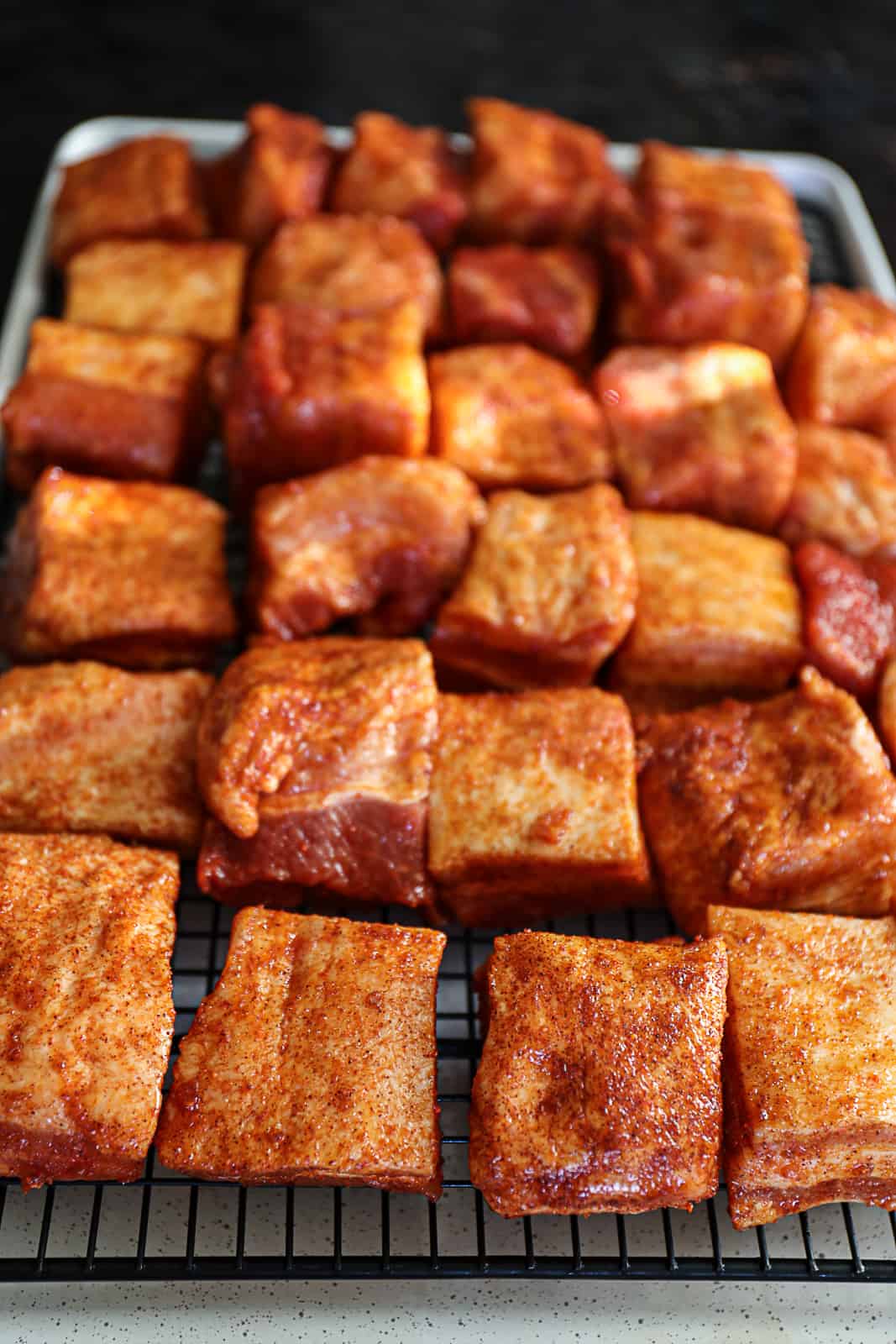 BBQ seasoning ingredients on Traeger Smoked Pork Belly cubes
