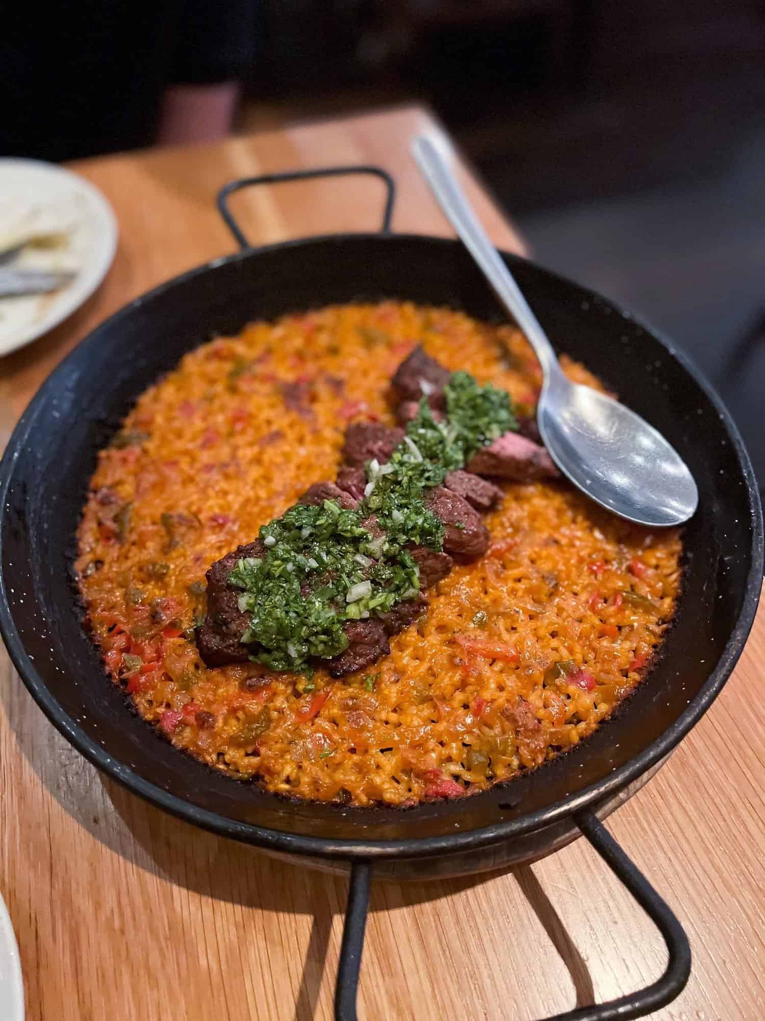 Bulla Gastropub Menu Steak Paella in Plano Texas Legacy West