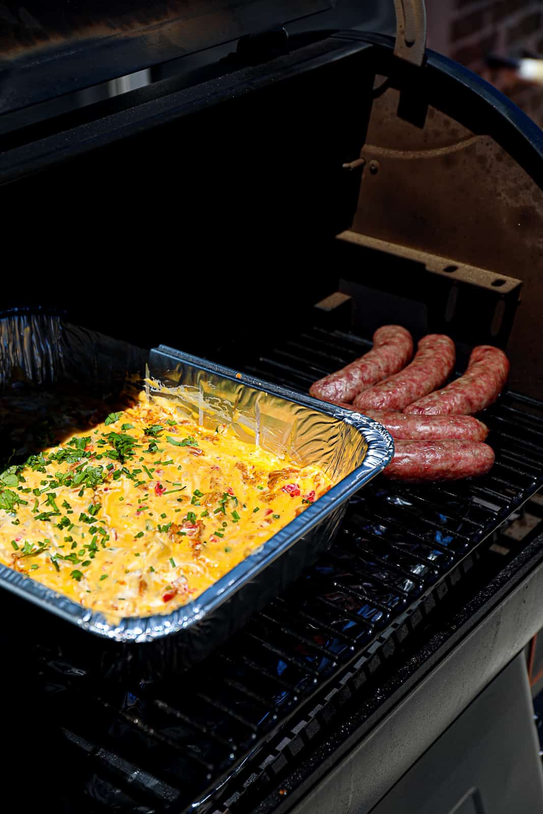 Smoked Queso With Sausage Smoking at the same time on the Traeger at 250