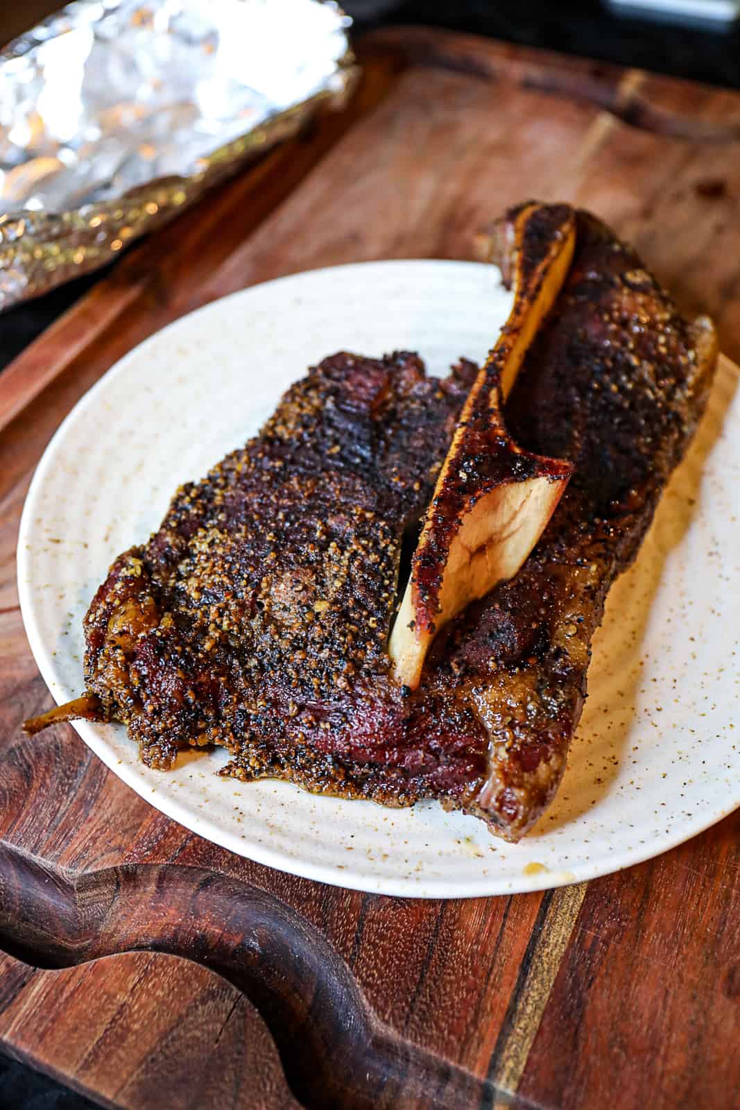 Traeger Smoked 7 Bone In Chuck Roast Resting on a cutting board