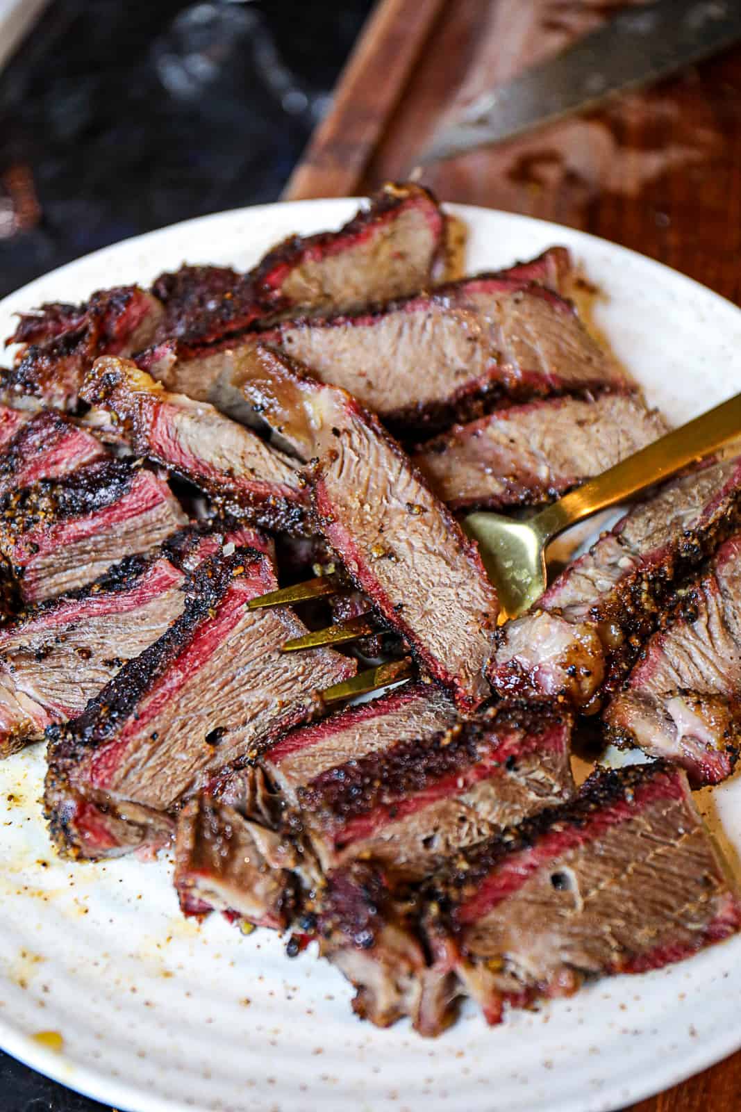 Traeger Smoked 7 Bone In Chuck Roast Sliced on a plate