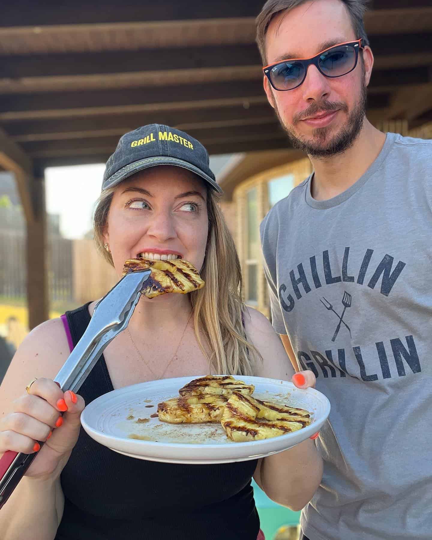 Weber Grill Food Bloggers Jenna Passaro Eating Grilled Pineapple Recipe