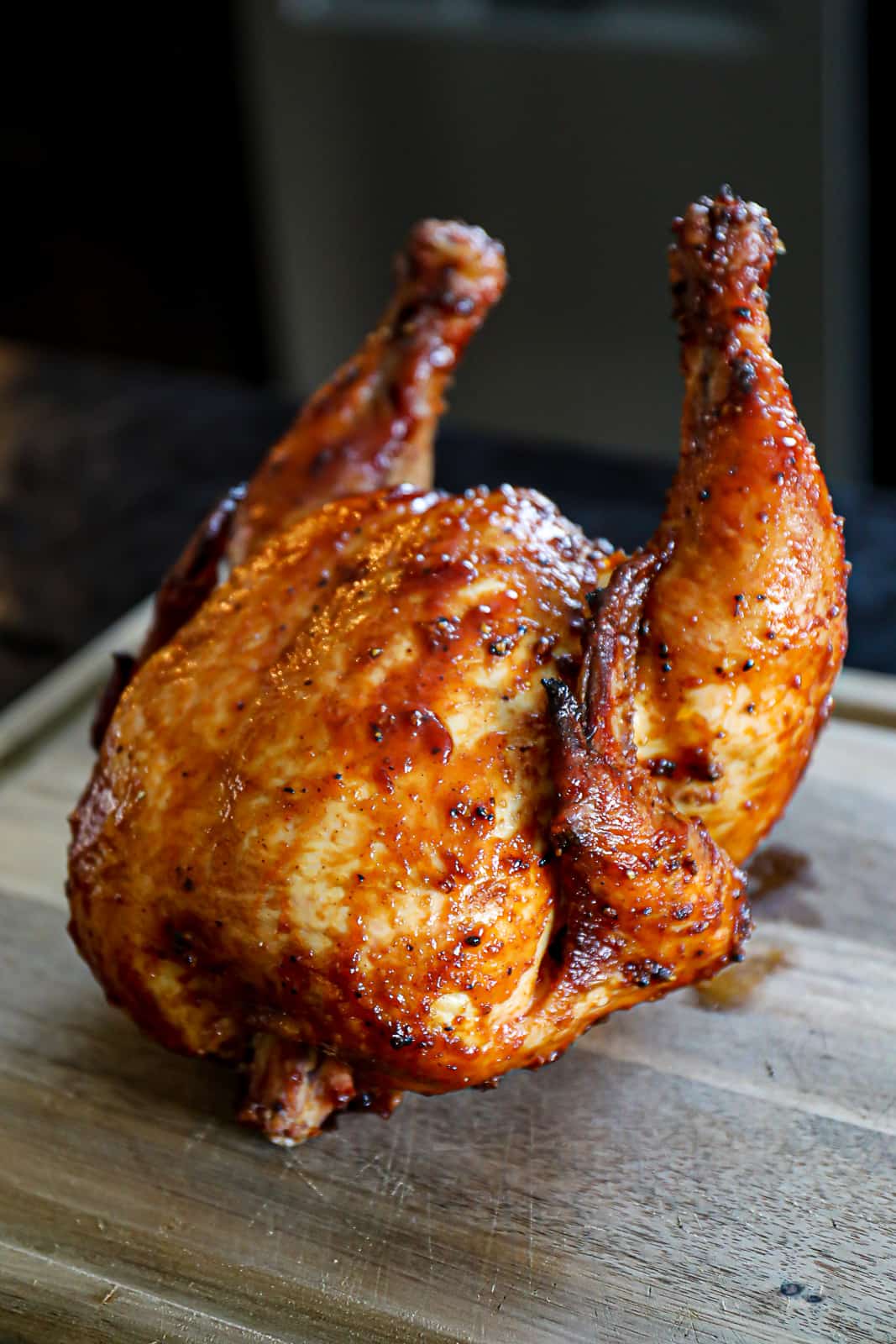 Pellet Grill Smoked Beer Can Chicken After Smoking And Resting On A Cutting Board