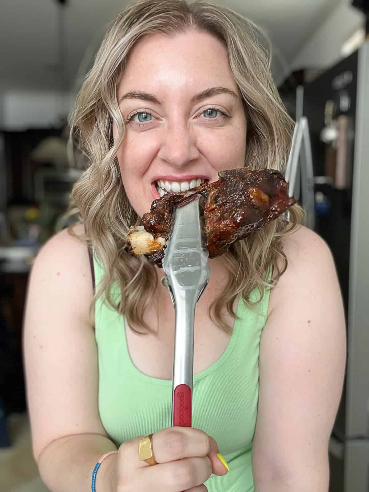 Sip Bite Go Food Blogger Eating Baked Beef Back Ribs With BBQ Sauce