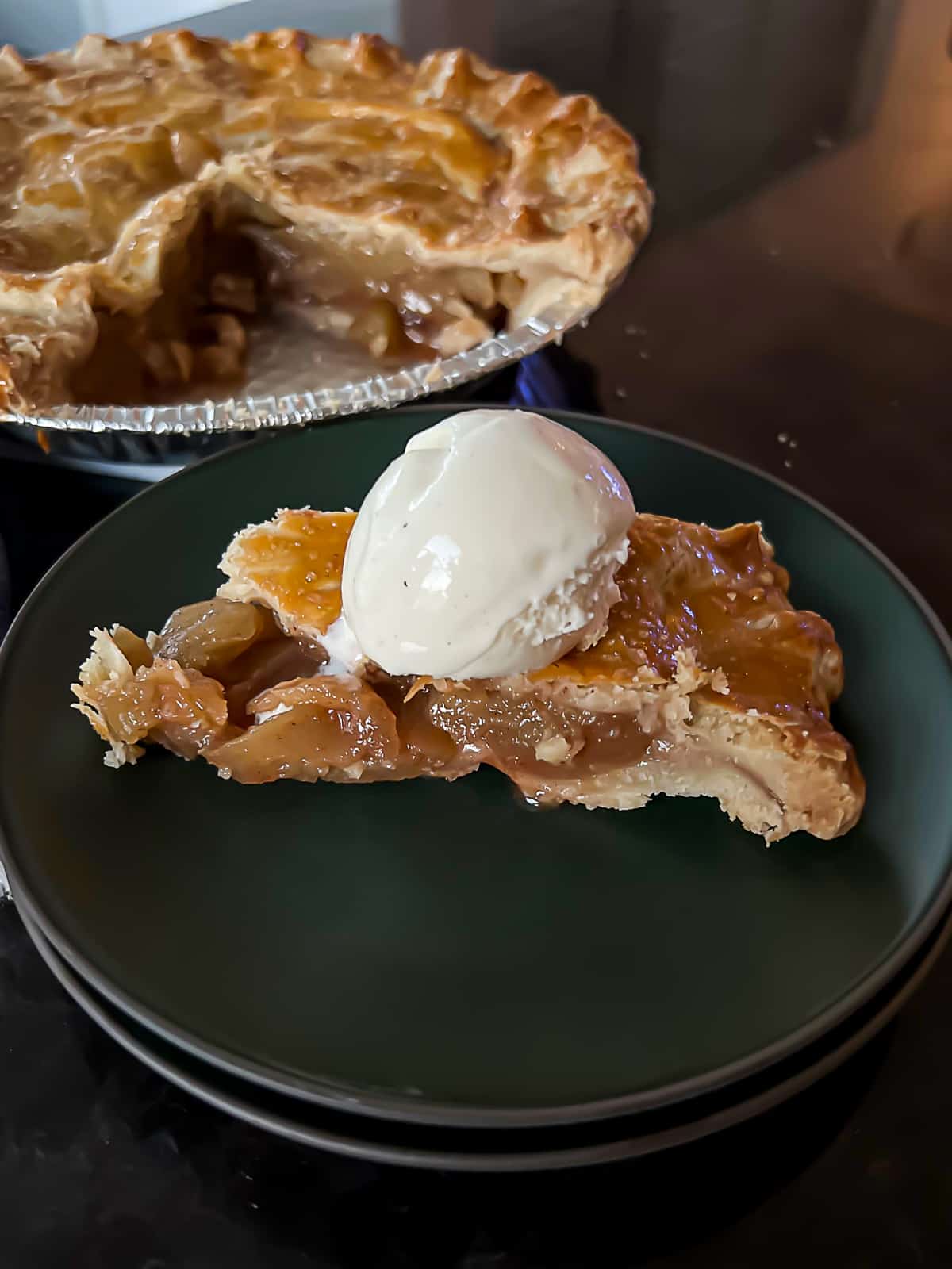 Slice of Traeger Smoked Apple Pie Recipe With Vanilla Ice Cream