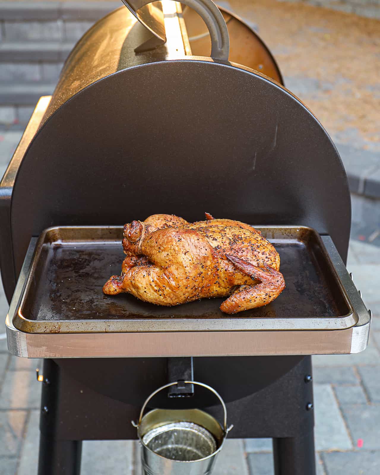 Smoked Whole Chicken Game Day Traeger Main Dish resting on a tray