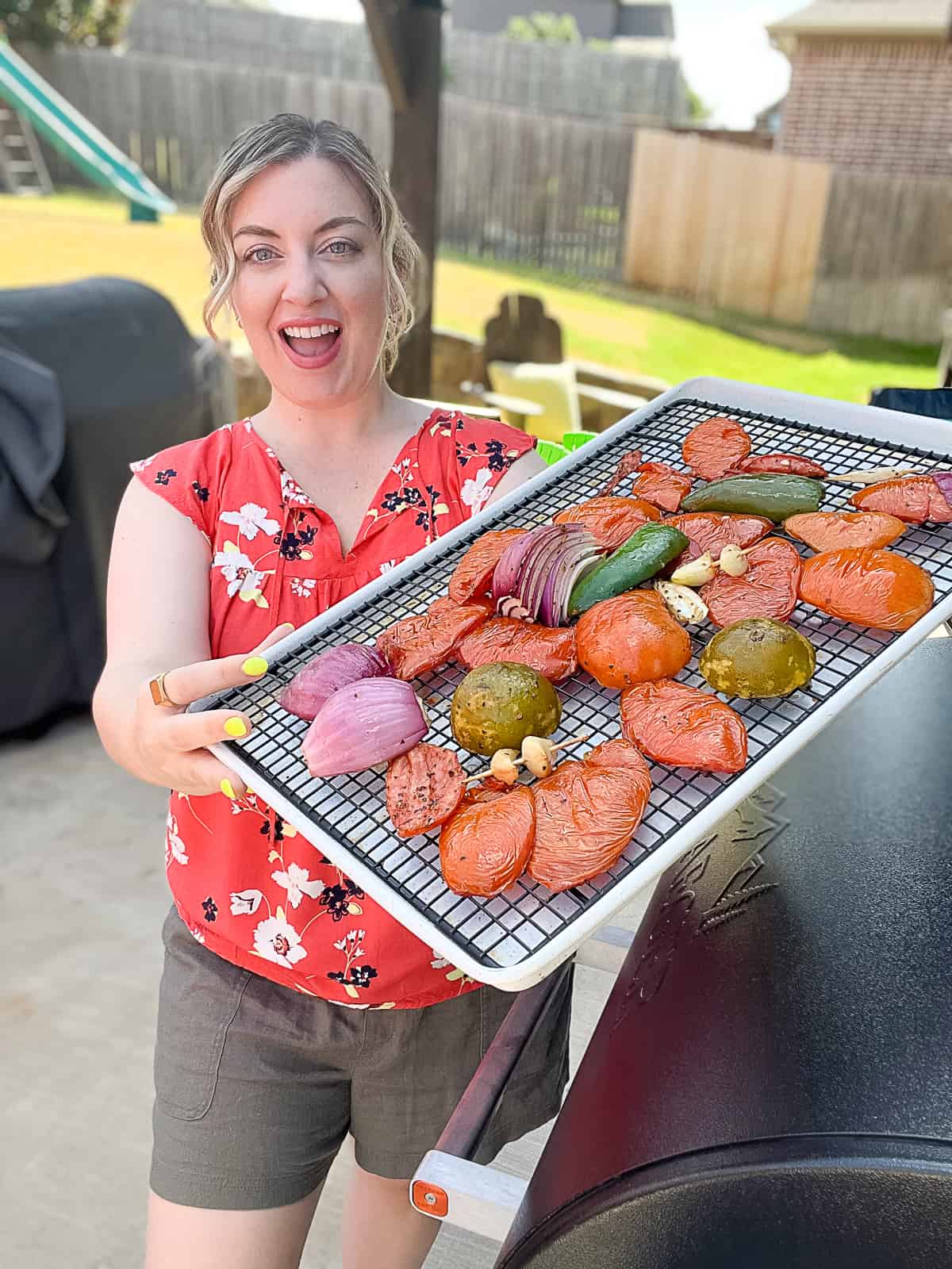 Smoking Salsa Ingredients Prepped for the Traeger held by Jenna Passaro food blogger from Sip Bite Go
