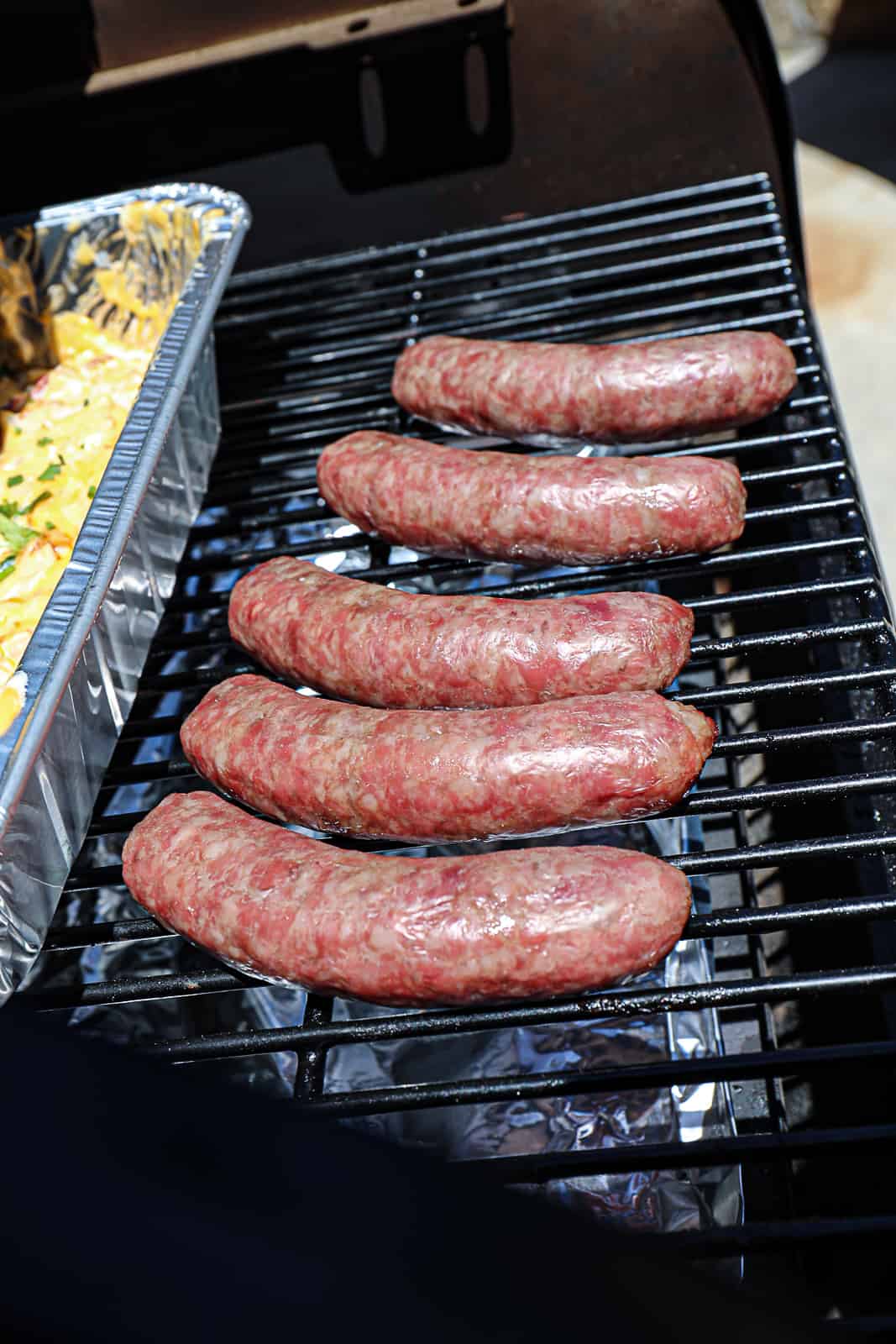 Smoking beer brats on the Traeger for game day sandwiche