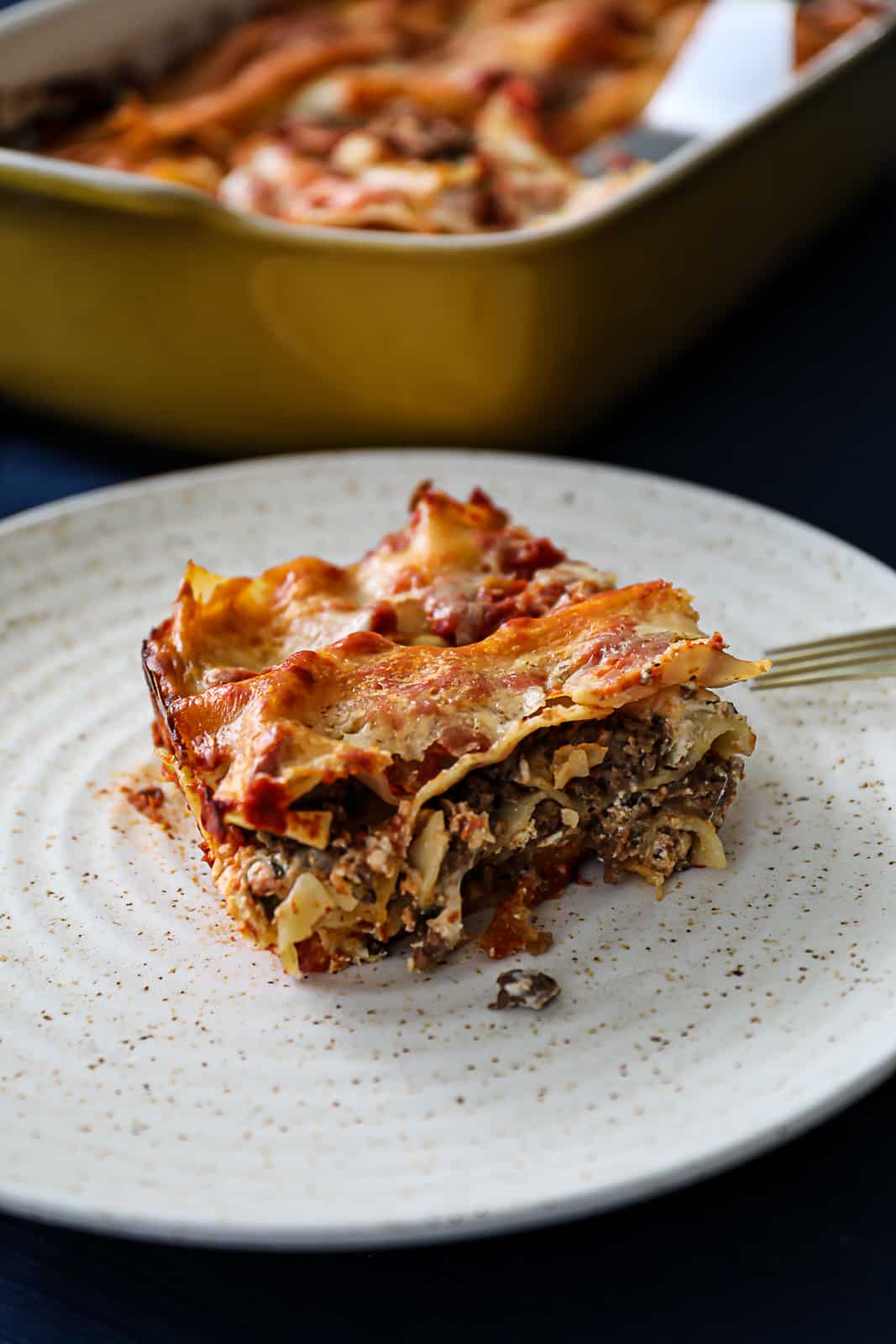 Traeger Game Day Lasagna Recipe Served On A Dinner Plate