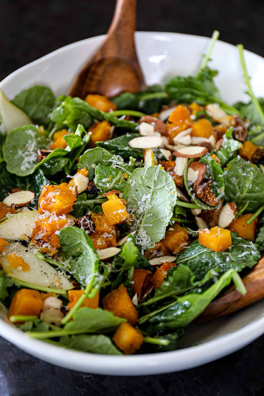 Closeup of butternut squash salad with sage dressing in a salad appetizer dish