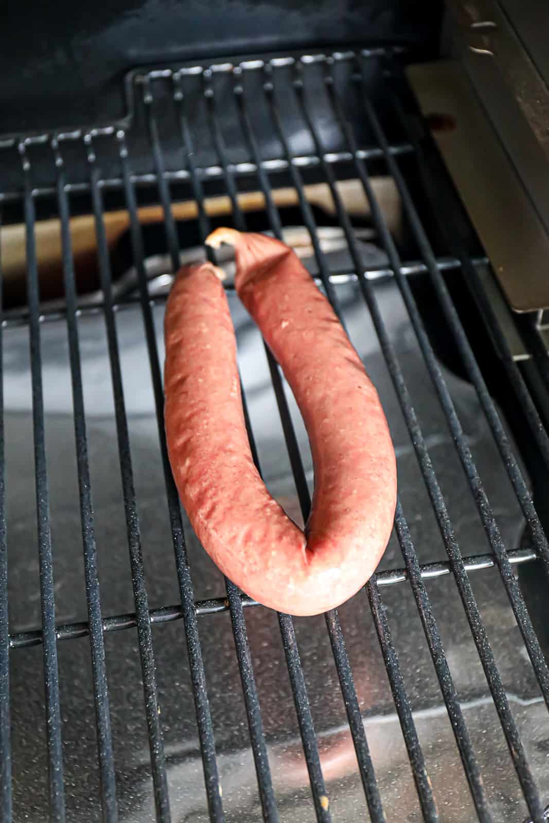 Smoking Kielbasa Sausage on Traeger pellet grill grates