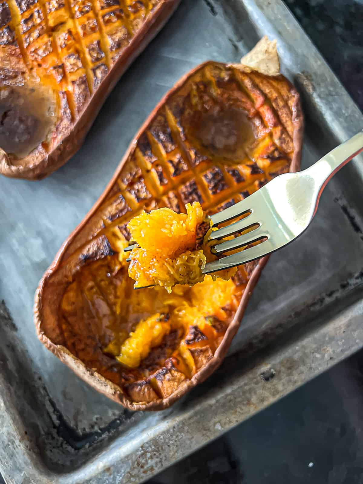 Traeger Smoked Butternut Squash Soft Cooked With a fork on a serving tray