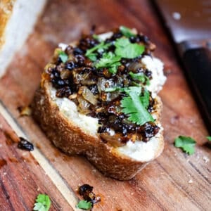 Appetizer Toast with Shallots And Brie On A Baguette