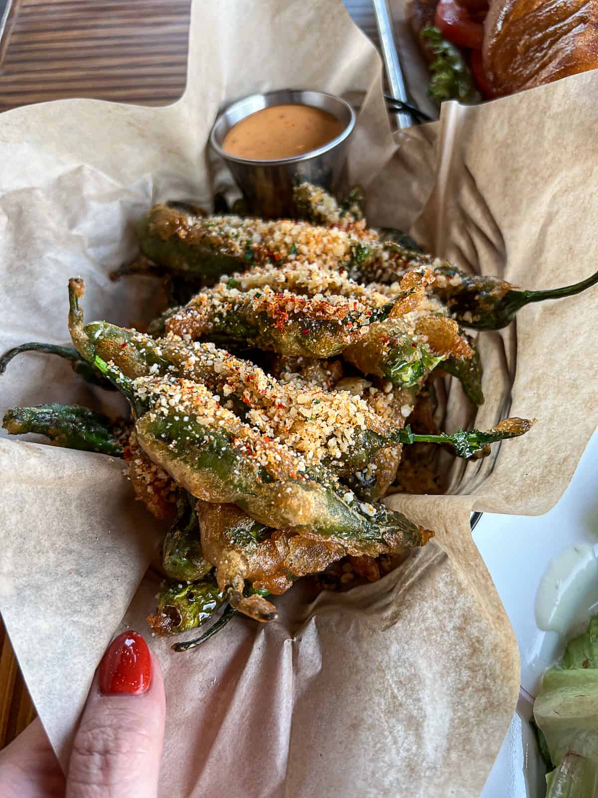 Breaded and fried peppers from the appetizer menu at Revelry on the Boulevard Austin TX