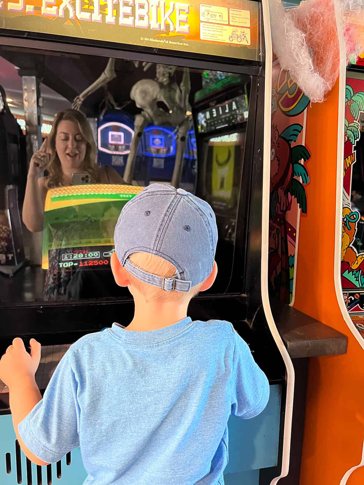 Kid playing Videogame at the Arcade Cidercade in Austin Texas