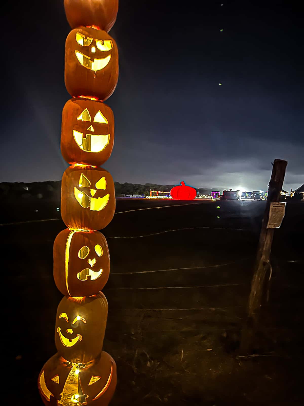 Stacked carved pumpkin decorations at Pumpkin Nights Austin 