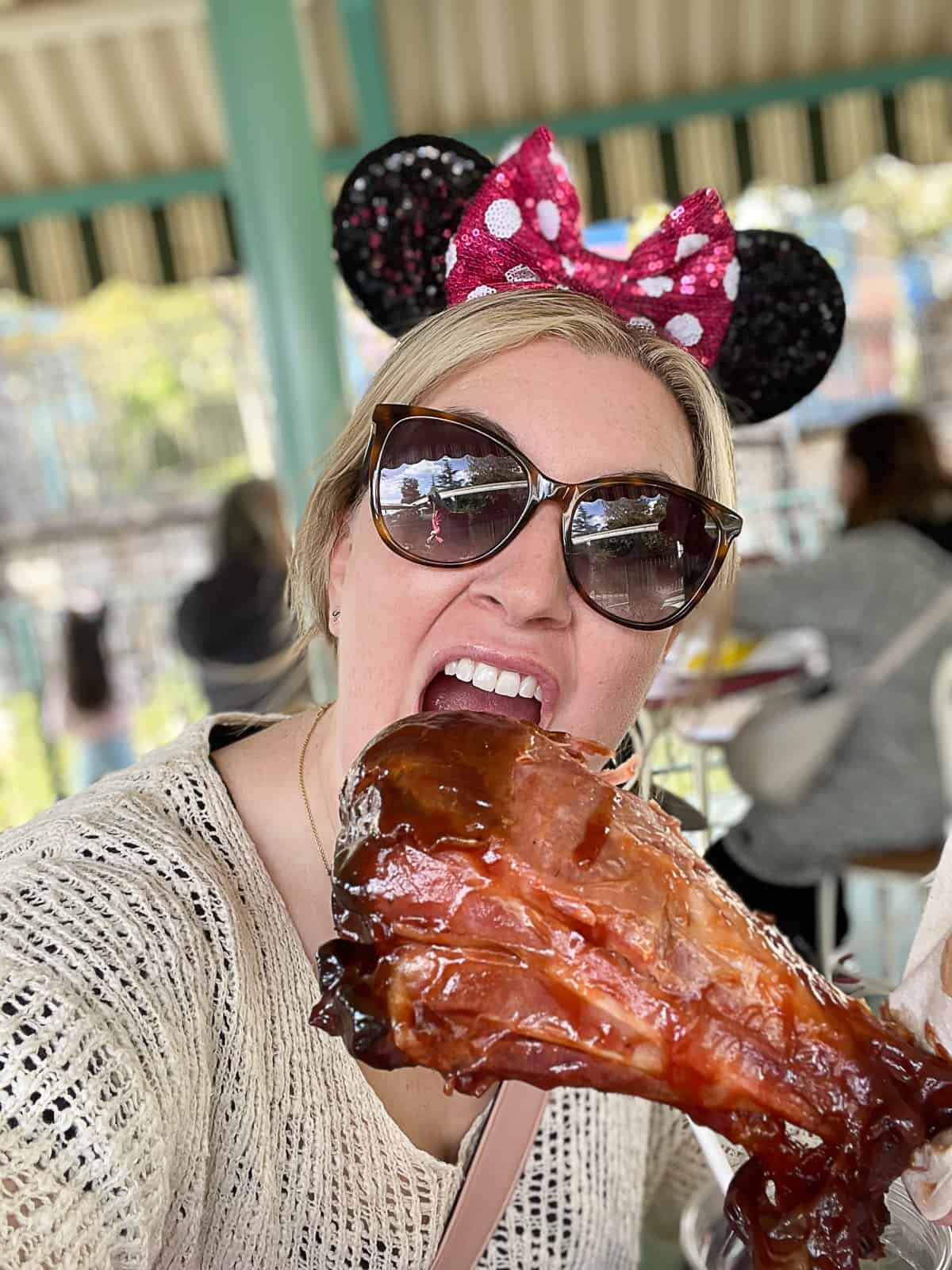 Jenna Passaro food blogger eating famouse smoked bbq Disney turkey leg recipe