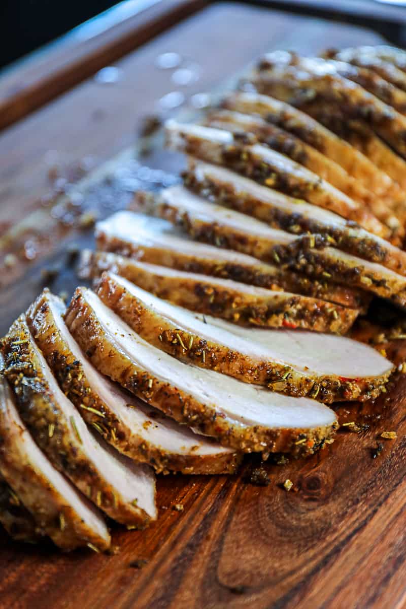 Smoked Thanksgiving Turkey Breast Sliced On Cutting Board