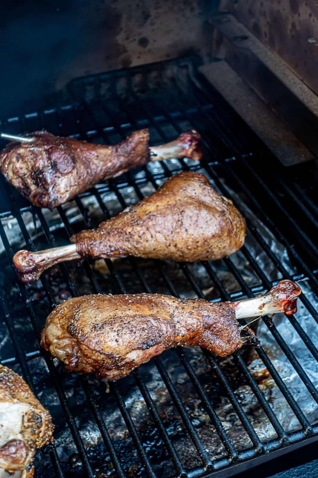 Smoking turkey legs in bulk on the Traeger grill Sip Bite Go