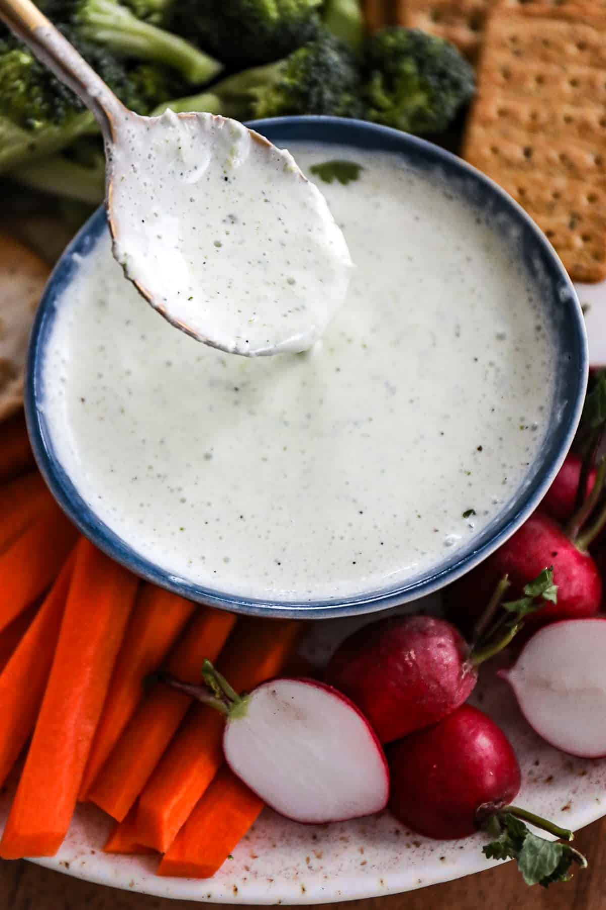 Green Spring Onion Dip With Greek Yogurt on a vegetable platter