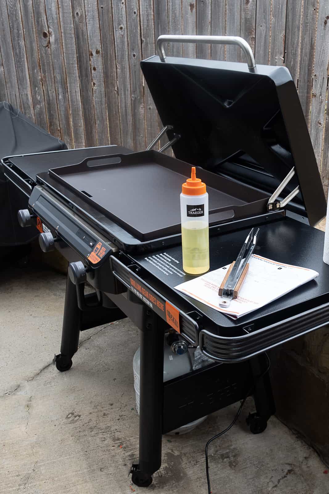 https://sipbitego.com/wp-content/uploads/2023/02/New-Traeger-Grills-Flatrock-Grill-with-oil-bottle-and-grilling-tools-Sip-Bite-Go.jpg