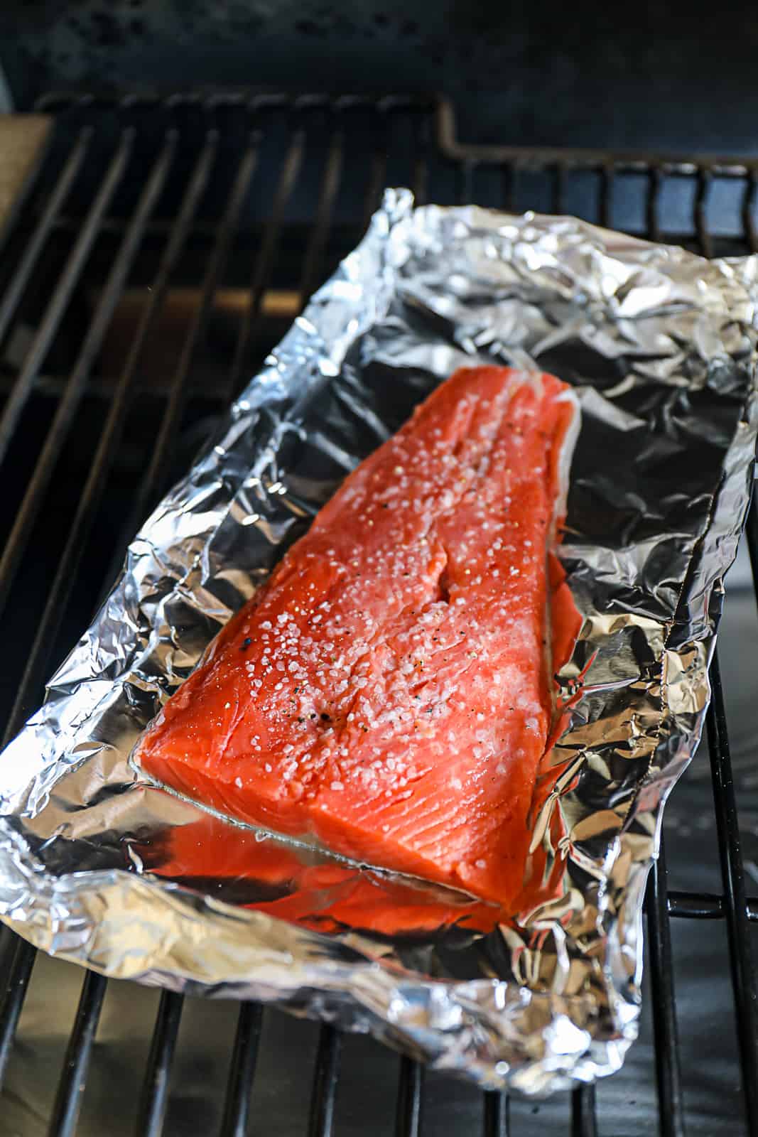 Smoking salmon on foil in a Traeger pellet grill