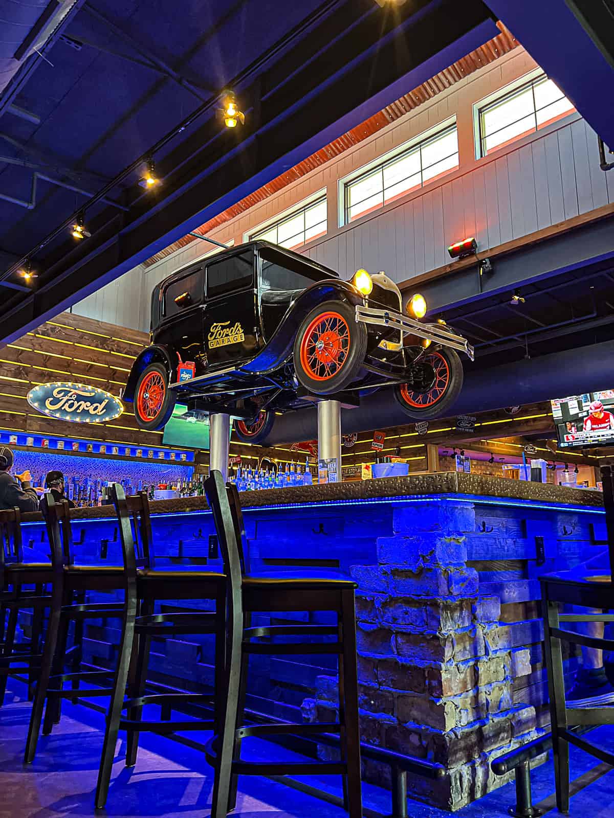 Bar with Car in the air at Fords Garage Plano