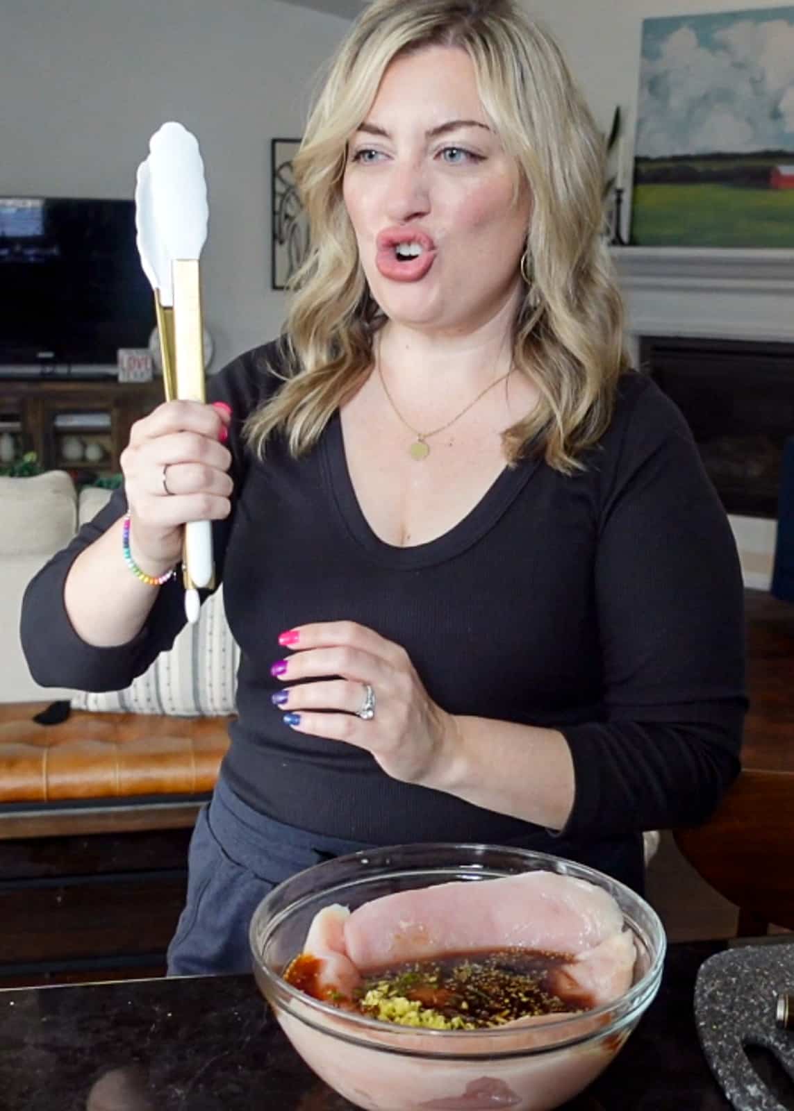 Jenna Passaro food blogger making teriyaki marinade for griddled chicken breast recipe