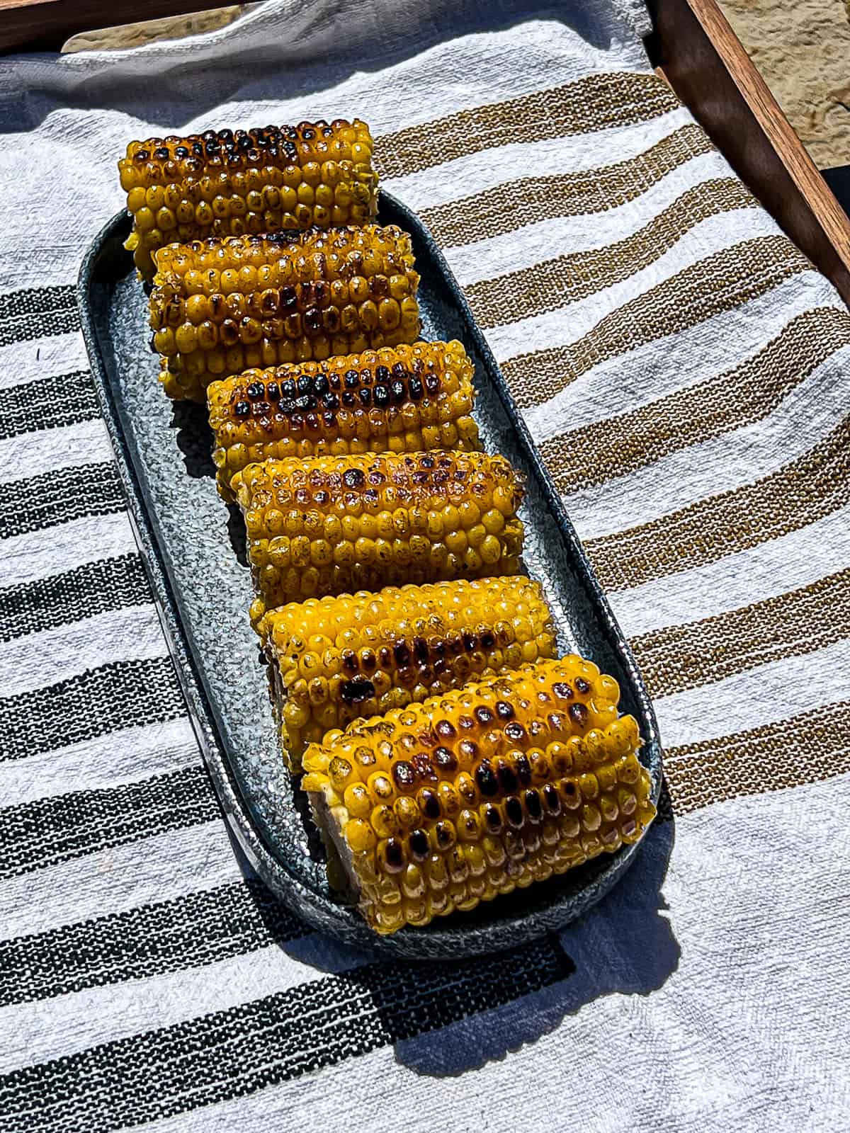 https://sipbitego.com/wp-content/uploads/2023/04/Blackstone-Flattop-Recipe-for-Griddle-Corn-On-The-Cob-Sip-Bite-Go.jpg