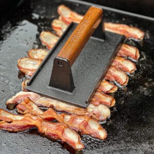 Cooking Bacon on Griddle with Traeger Grills press using the Flatrock Grill