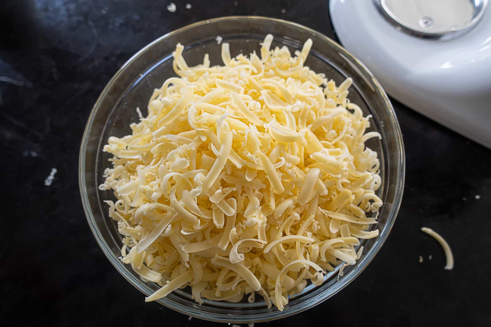 Fresh shredded cheese using the Kitchenaid Fresh Prep Slicer Shredder Attachment Review and Demo