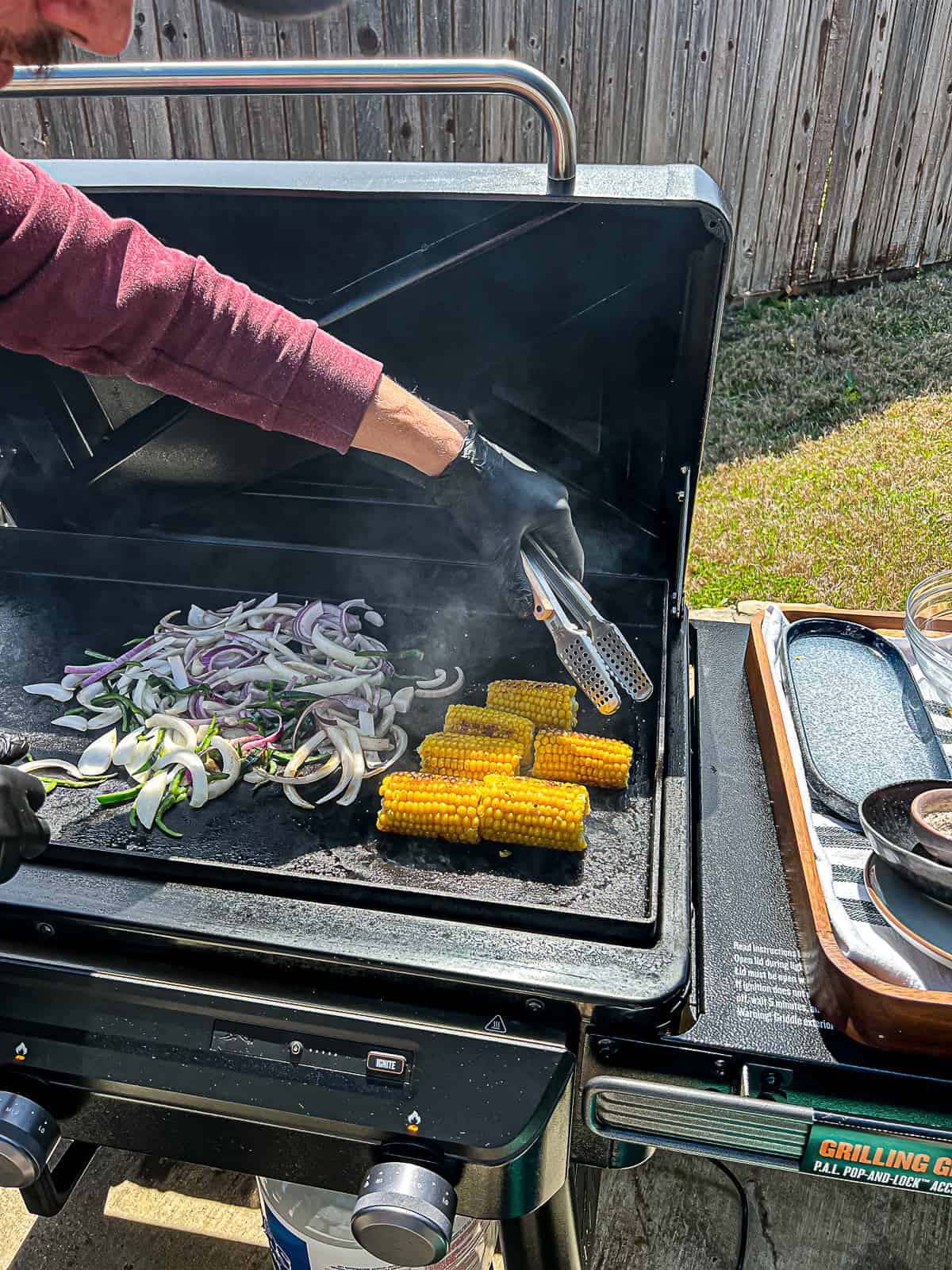 Griddle Cooking Corn On The Cob on Traeger Flatrock Grill with Griddled Onions And Peppers