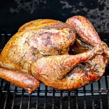 Smoked Turkey Recipe cooking on a Traeger Pellet Grill