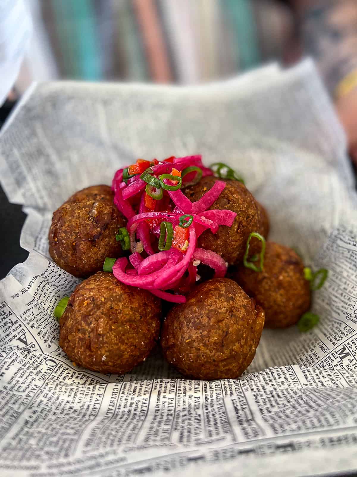 Bifongo plantain balls menu item from ​​El Cuchifrito Comido de Barrio restaurant in the pavilion of Casa Bacardi