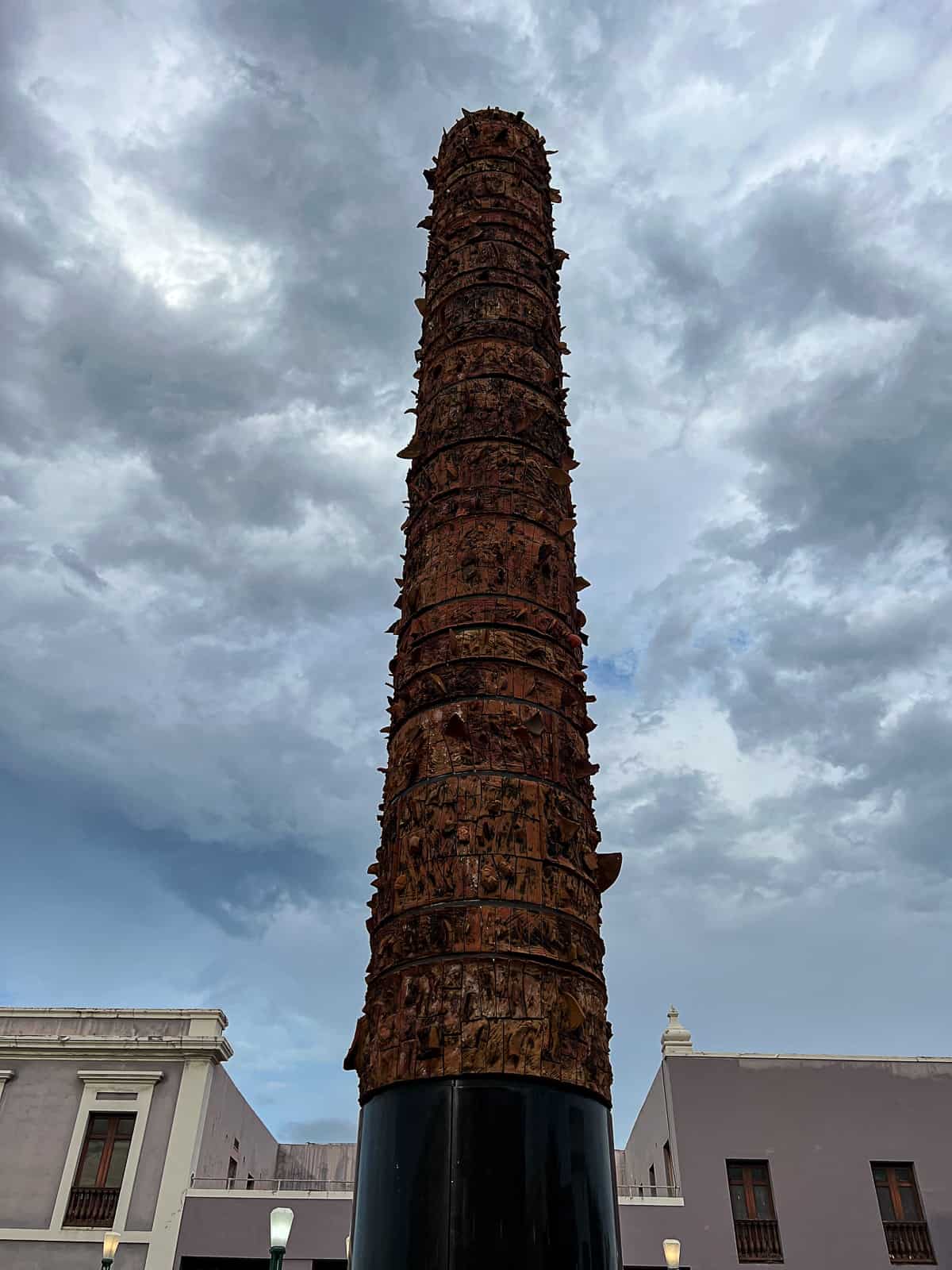 Closeup of Totem Pole in San Juan Plaza del Quinto Centenario